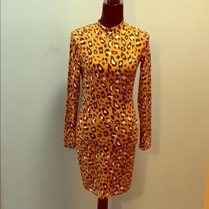 Long sleeve cheetah dress size medium.